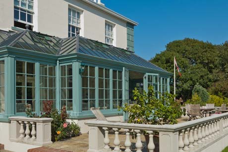 Finished sun room conservatory with double doors to the veranda