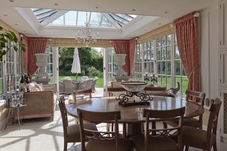Conservatory extension with double doors opening to the garden