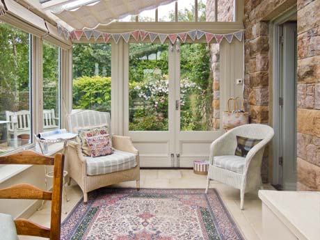 Lean-to conservatory with internal roof and side blinds
