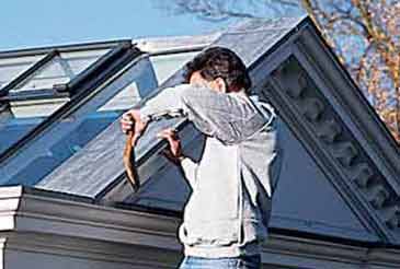 Lead flashings being formed on a conservatory roof